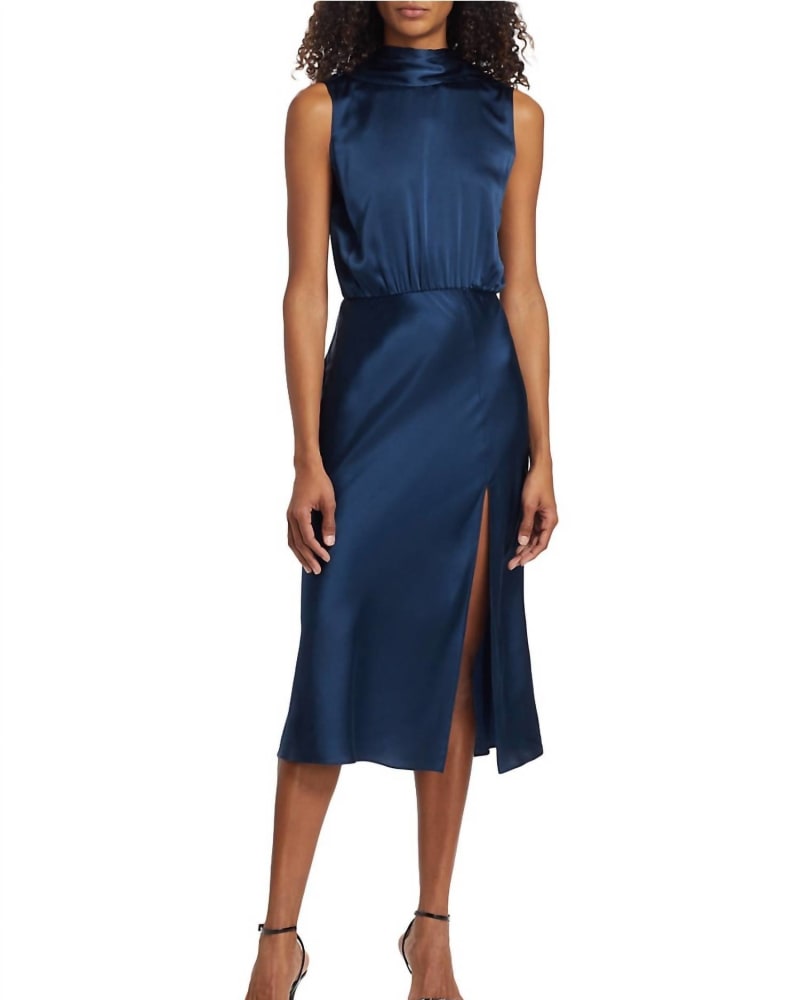 Front of a model wearing a size L Walden Tie-Back Midi Dress In Navy in Navy by Amanda Uprichard. | dia_product_style_image_id:342247